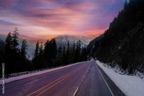 Winter background of road and snow mountains landscape,