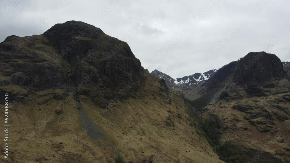 Ethereal atmosphere that shroud the The Three Sisters of Glen Coe adding mystique and enhancing the overall grandeur of the panoramic view. Ethereal atmosphere that shroud the The Three Sisters of Glen Coe adding mystique and enhancing the overall grandeur of the panoramic view.