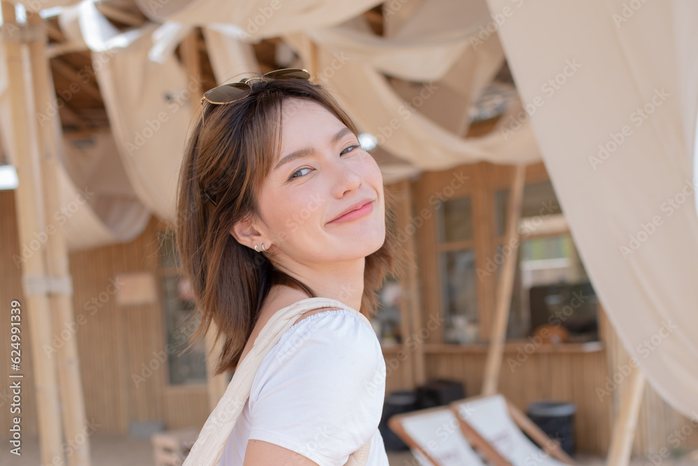 young slim beautiful woman, playful, summer vacation, sunny, having fun, positive mood, romantic, traveller, happy, cafe, woman in white on the summer beach with wind in her hair. young slim beautiful woman, playful, summer vacation, sunny, having fun, positive mood, romantic, traveller, happy, cafe, woman in white on the summer beach with wind in her hair.