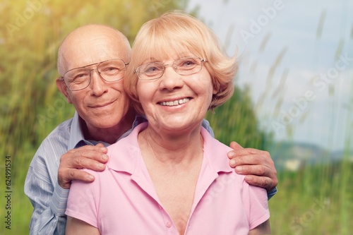Happy senior couple having fun at park