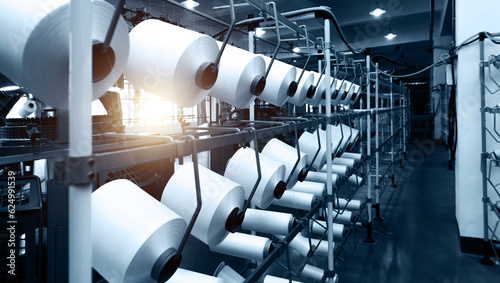 Cuadro en lienzo Textile factory in spinning production line and a rotating machinery