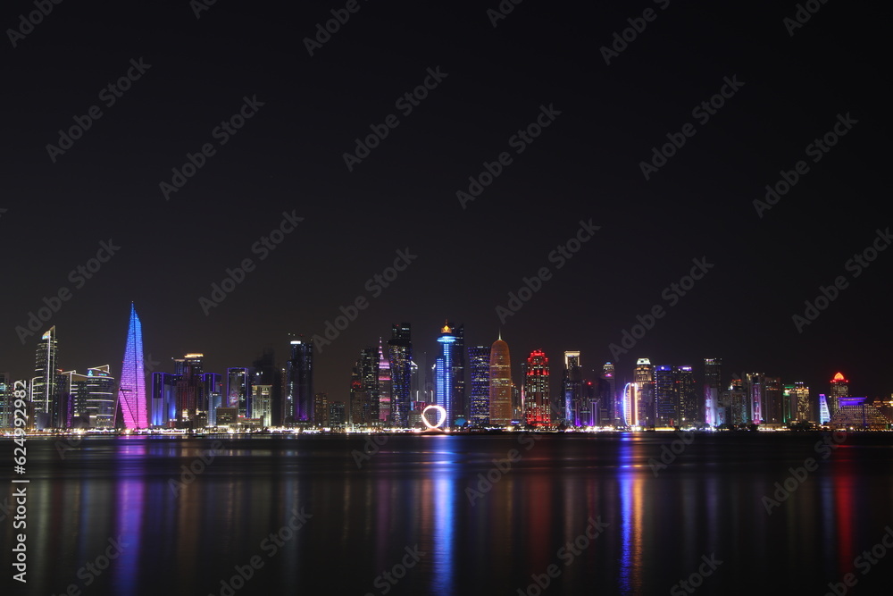 Fototapeta premium Qatar at night lights view at corniche road 