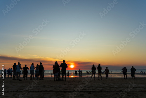 People watching the sunset at Mindil Beach. Darwin, Australia.
