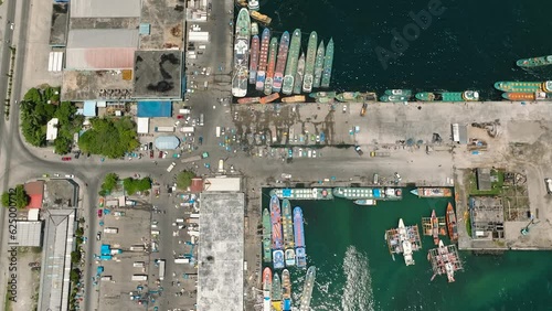 Fishing boats under sunlight in coastal of General Santos Fish Port Complex. Mindanao, Philippines. photo