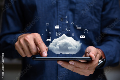 Hand of businessman using smartphone with cloud computing, Computer system resources and data storage, Cloud service technologies concept. photo