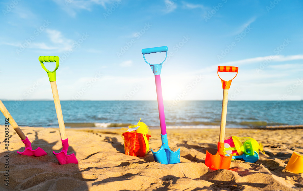 Group of children's beach toys on sunny day Group of children's beach toys on sunny day