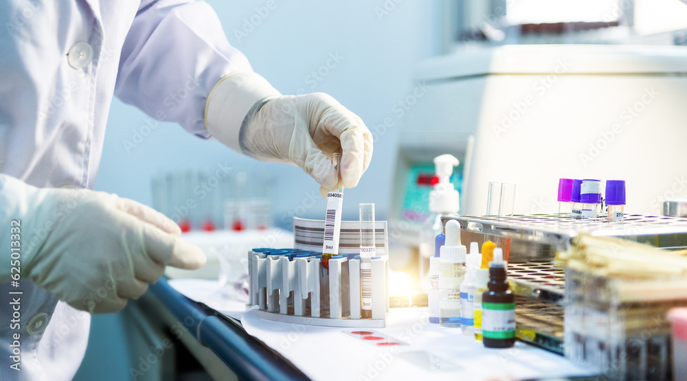 Detail of scientist working at laboratory Detail of scientist working at laboratory