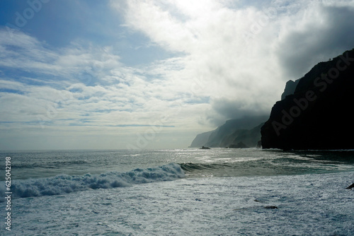 Ocean and rocks. Waves wind and clouds. Landscapes of Madeira.