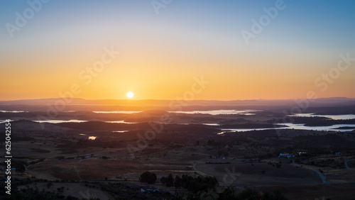 Portugal, Monsaraz, Alentejo. View from the fortress walls to Guadiana river and shores at sunrise