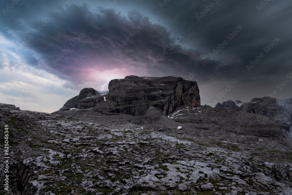 top of the grostÃ¨ dolomites of the brenta trentino during a storm