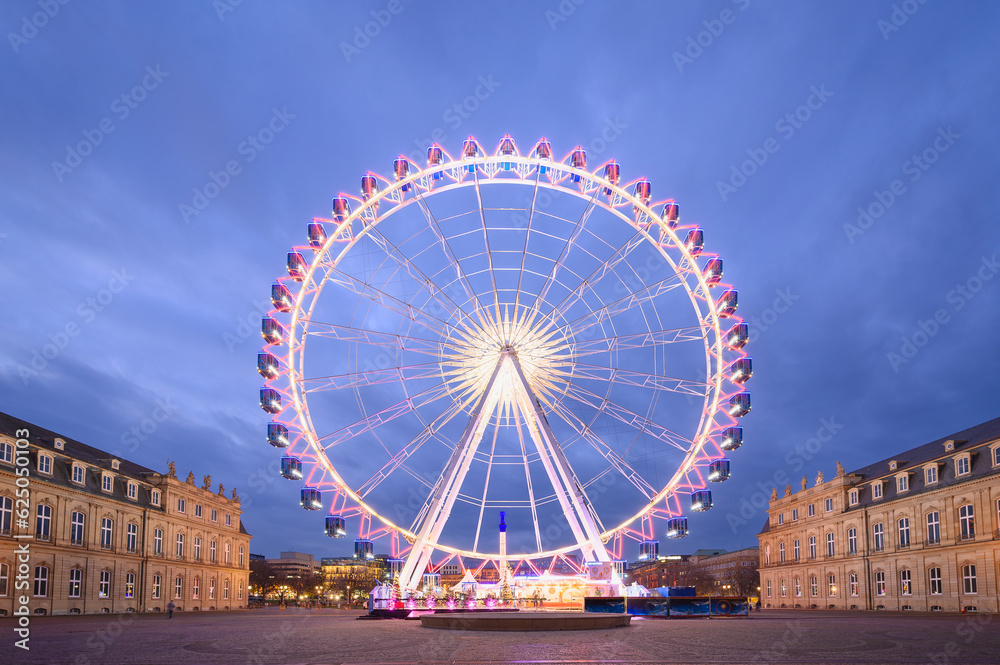 A Ferris Wheel illuminates the Night Stuttgart Germany