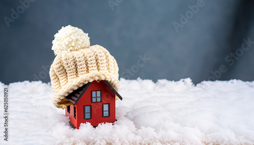 Obraz na płótnie house in winter - heating system concept and cold snowy weather with model of a