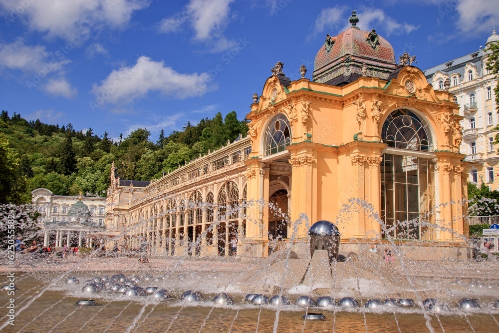 The stunning building of the Maxim Gorki colonnade with fountain in front at spa city Marianske Lazne, Czech republic