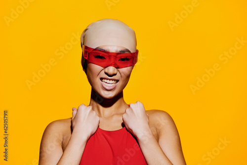Asian woman sunglasses emotion beauty portrait studio yellow red smiling fashion one positive hair