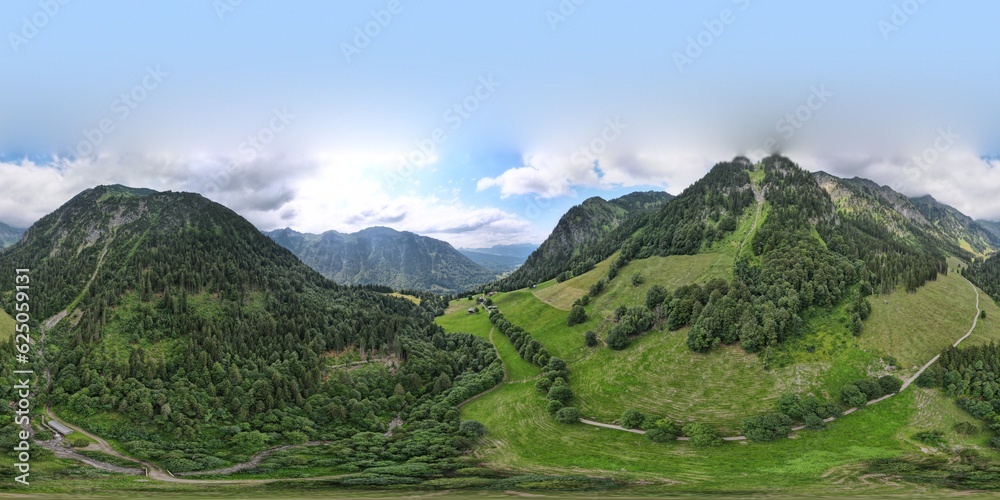 360 degrees panoramic view of the green forest and meadows in the mountains in summertime in Gottenried, Oberstdorf, Bavaria