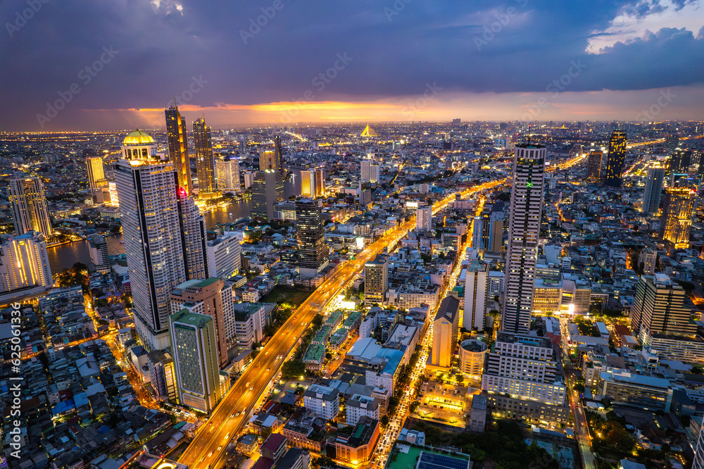 Aerial view of Saphan Taksin and Chao Phraya river in Bangkok, Thailand