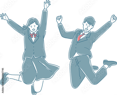 飛び跳ねて喜ぶ学生　男女