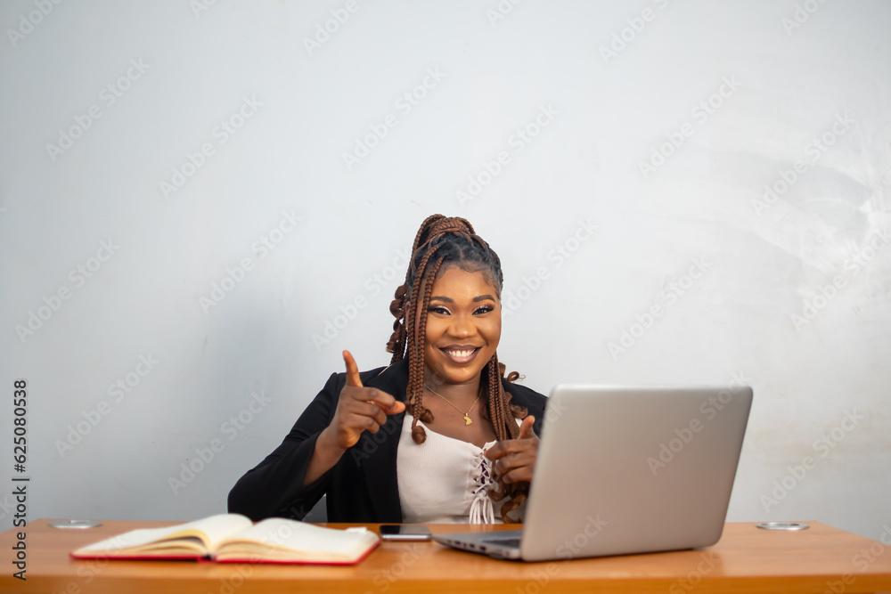 Businesswoman using laptop at office desk Businesswoman using laptop at office desk