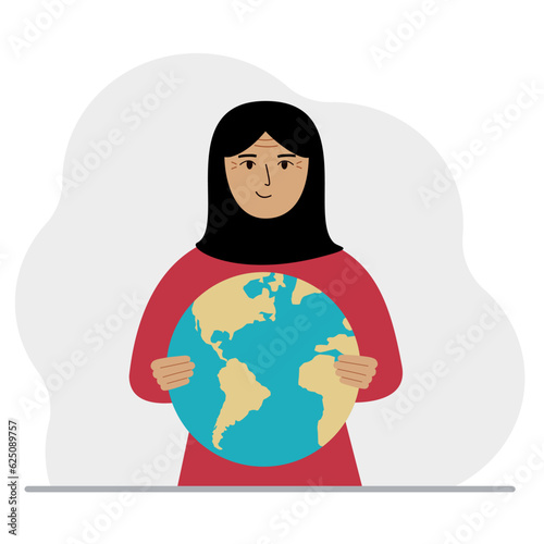 A woman deposits the planet Earth in his hand. Earth day holiday concept, saving the planet, global warming or climate change.