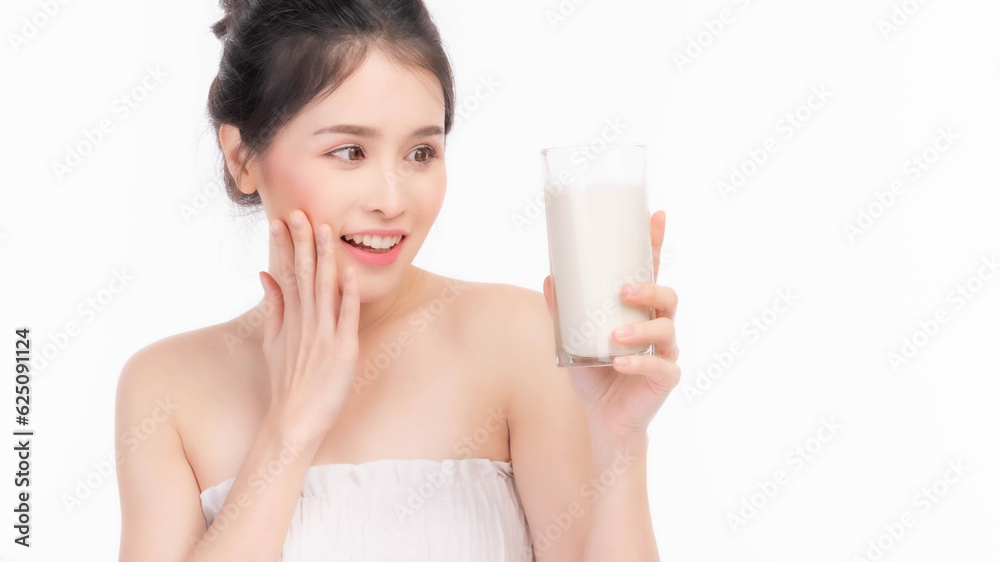 beauty woman Asian cute girl feel happy drinking milk for good health in the morning on white background - lifestyle beauty woman concept beauty woman Asian cute girl feel happy drinking milk for good health in the morning on white background - lifestyle beauty woman concept