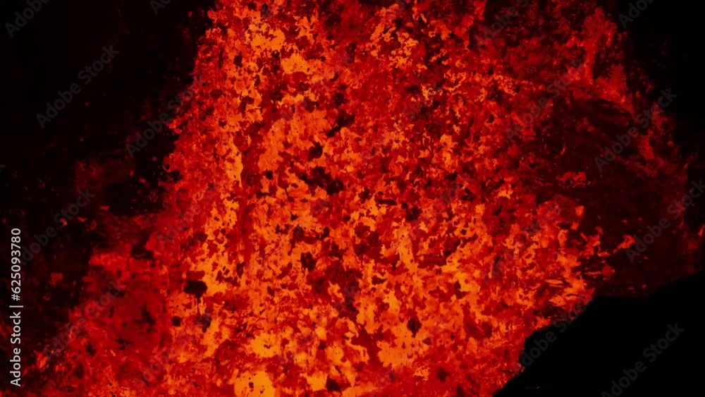 Extreme close up of molten lava exploding from active volcano crater Extreme close up of molten lava exploding from active volcano crater