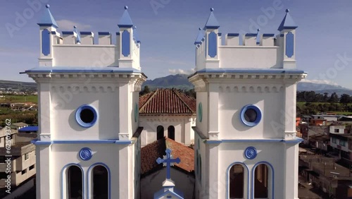 4k drone shot with panning motion from a close-up of the Tucuso church in the city of Machachi, Pichincha, Ecuador.
