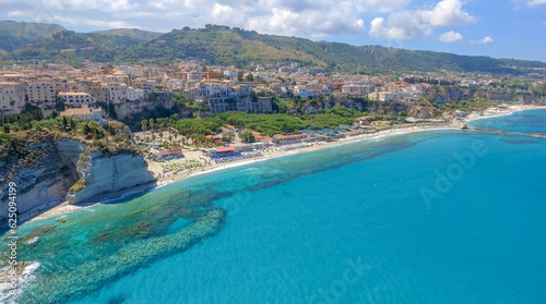Panoramic aerial view of Tropea coastline and beaches in summer, Calabria - Italy