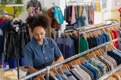 Young adult female shopping in a thrift store