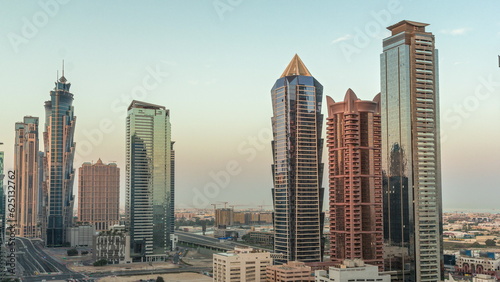 Business bay district skyline with modern architecture morning timelapse from above. © neiezhmakov