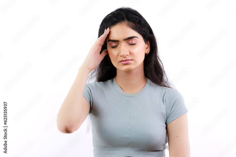 Headache Experienced by Stressed Out Young Indian Girl in Unconscious and Unwell State of Mind - Face Expressions Headache Experienced by Stressed Out Young Indian Girl in Unconscious and Unwell State of Mind - Face Expressions