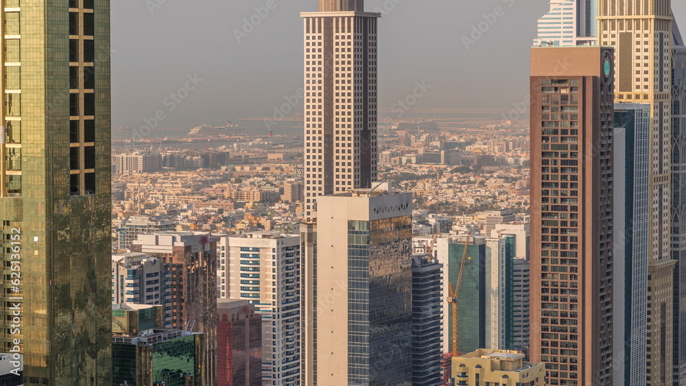 Skyline view of the high-rise buildings along Sheikh Zayed Road in Dubai aerial timelapse, UAE.