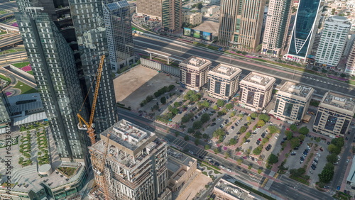 Construction site and buildings on Sheikh Zayed Road in Dubai aerial timelapse, UAE.