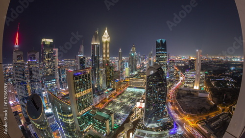 Skyline panorama of the high-rise buildings on Sheikh Zayed Road in Dubai aerial night timelapse, UAE. #625136397