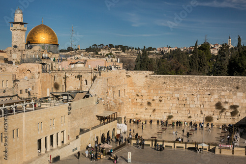 Western Wall, with the Dome of the Rock of the Al-Aqsa Mosque in the background, in the Old City of Jerusalem