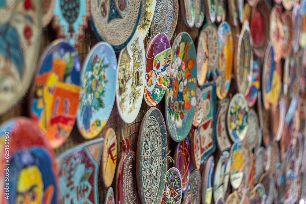 Isolated close up image of handcrafted plates for sale on the busy Yerevan Street- Armenia
