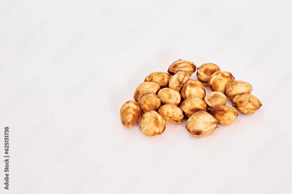 Side view of cherry pits on a white background. Close-up Side view of cherry pits on a white background. Close-up