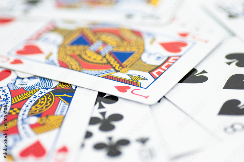 Intricate playing cards scattered on the table. Intricate playing cards scattered on the table.