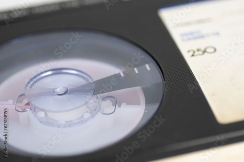 close-up videotape and cassette film seen through the transparent surface of the cassette