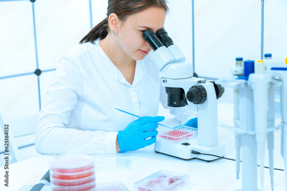 Genomics research: Microscopes are used to study the structure and org Genomics research: Microscopes are used to study the structure and org