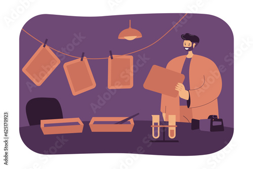 Photographer hanging photos in darkroom vector illustration. Happy man working with camera, developing chemicals and lighting in studio. Photography equipment, craft concept