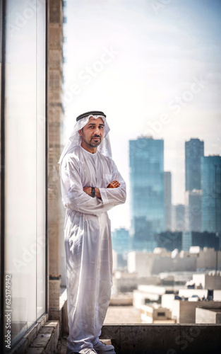 rich arab businessman in Traditional White Outfit in big city in background, generative AI