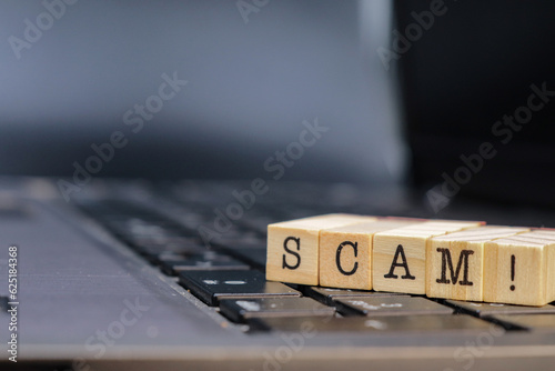 Digital scam concept written on cubes. design for phishing or fraud ideas.