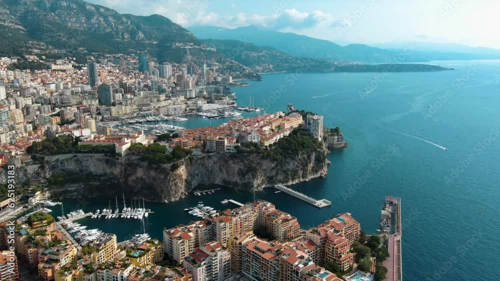 Monte Carlo, Monaco City aerial panoramic view with Prince's Palace, Saint Nicholas Cathedral and Museum of Oceanography around Port de Fontvieille in French Riviera near France in Europe 4K UHD