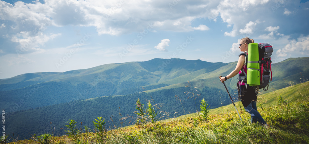 Young woman n the top of the mountains