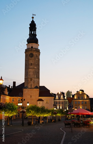 Bolesławiec city center. Square, city hall. Sunset in the center of Bolesławiec. Polish, European city. A magical sunset right in the heart of the city. Cobblestone in a European city. Quiet evening