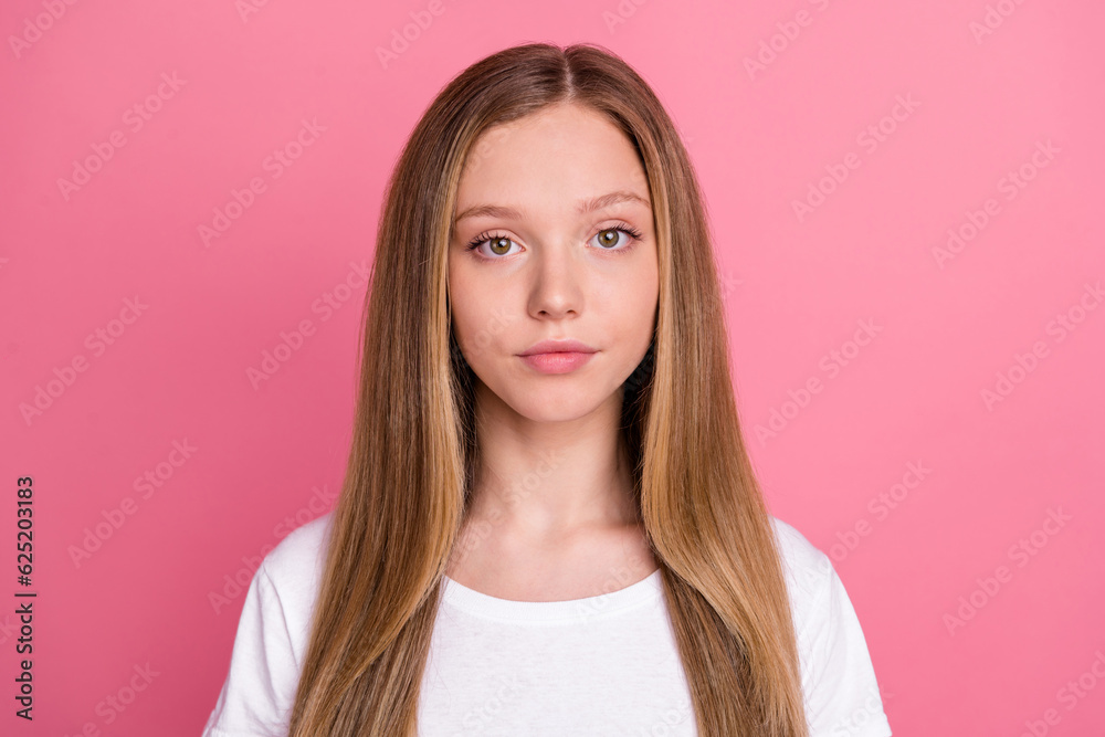 Photo of serious concentrated focused girl calm face look camera isolated on vibrant pink color background Photo of serious concentrated focused girl calm face look camera isolated on vibrant pink color background