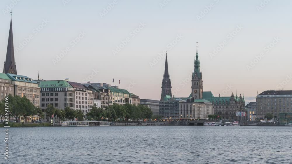 Hamburg Germany time lapse 4K, city skyline day to night timelapse at Alster Lake with Fountain Hamburg Germany time lapse 4K, city skyline day to night timelapse at Alster Lake with Fountain