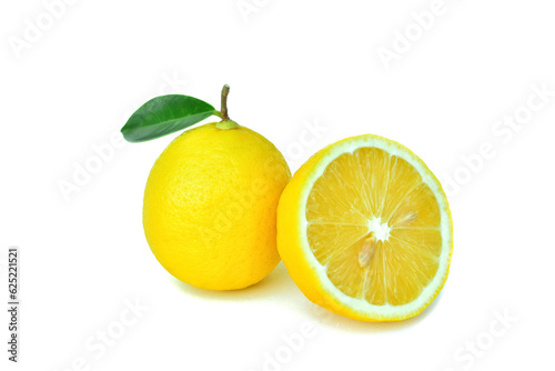 Lemon, sliced ​​​​in half, with fresh green leaves. Isolated on a white background