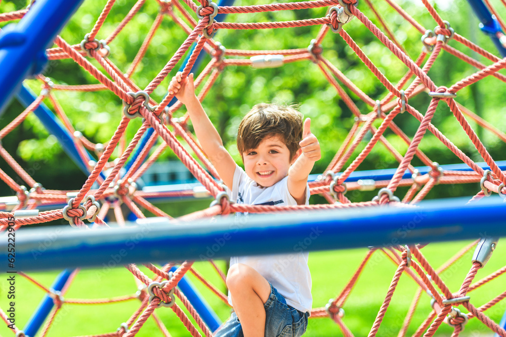 Kid exercise for health and sport concept. Happy child boy playing Kid exercise for health and sport concept. Happy child boy playing