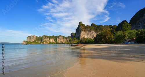 фотографія Rocky karst outcrop overlooking Railay West Beach on the Railay Peninsula in the